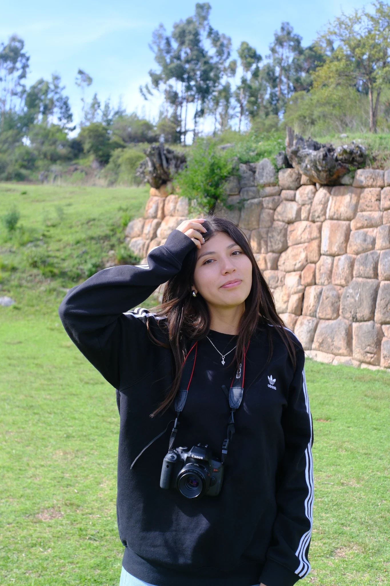 An AWAY co-founder with her camera in Cusco